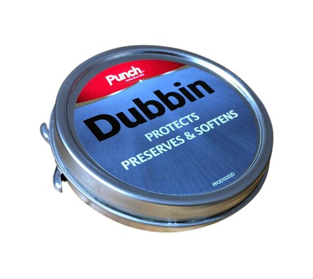 applying dubbin to boots