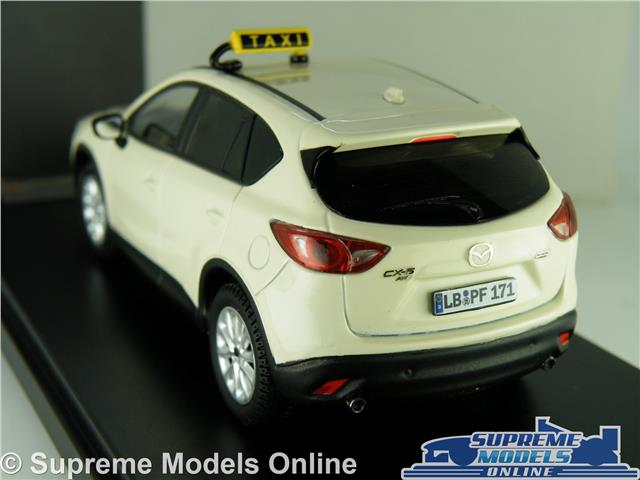 MAZDA CX-5 MODEL CAR TAXI CAB 2012 CREAM 1:43 SCALE IXO